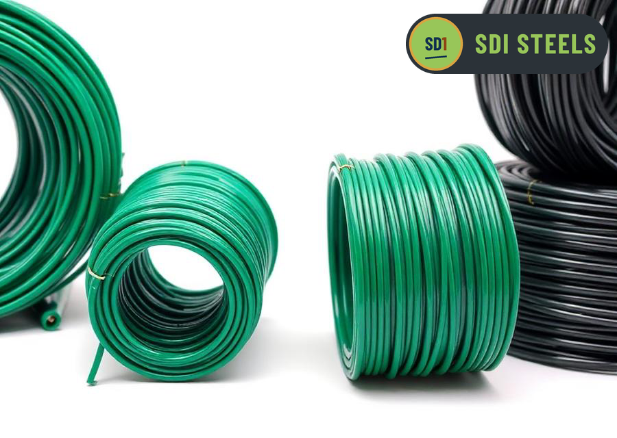Coils of green and black PVC coated wire